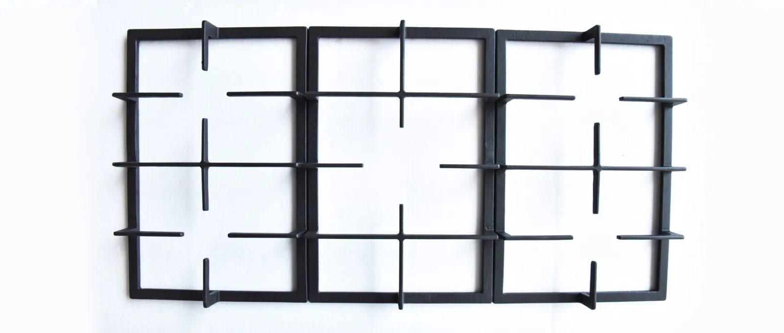 Cast iron pan support component sample photographed for stove and burner assembly review