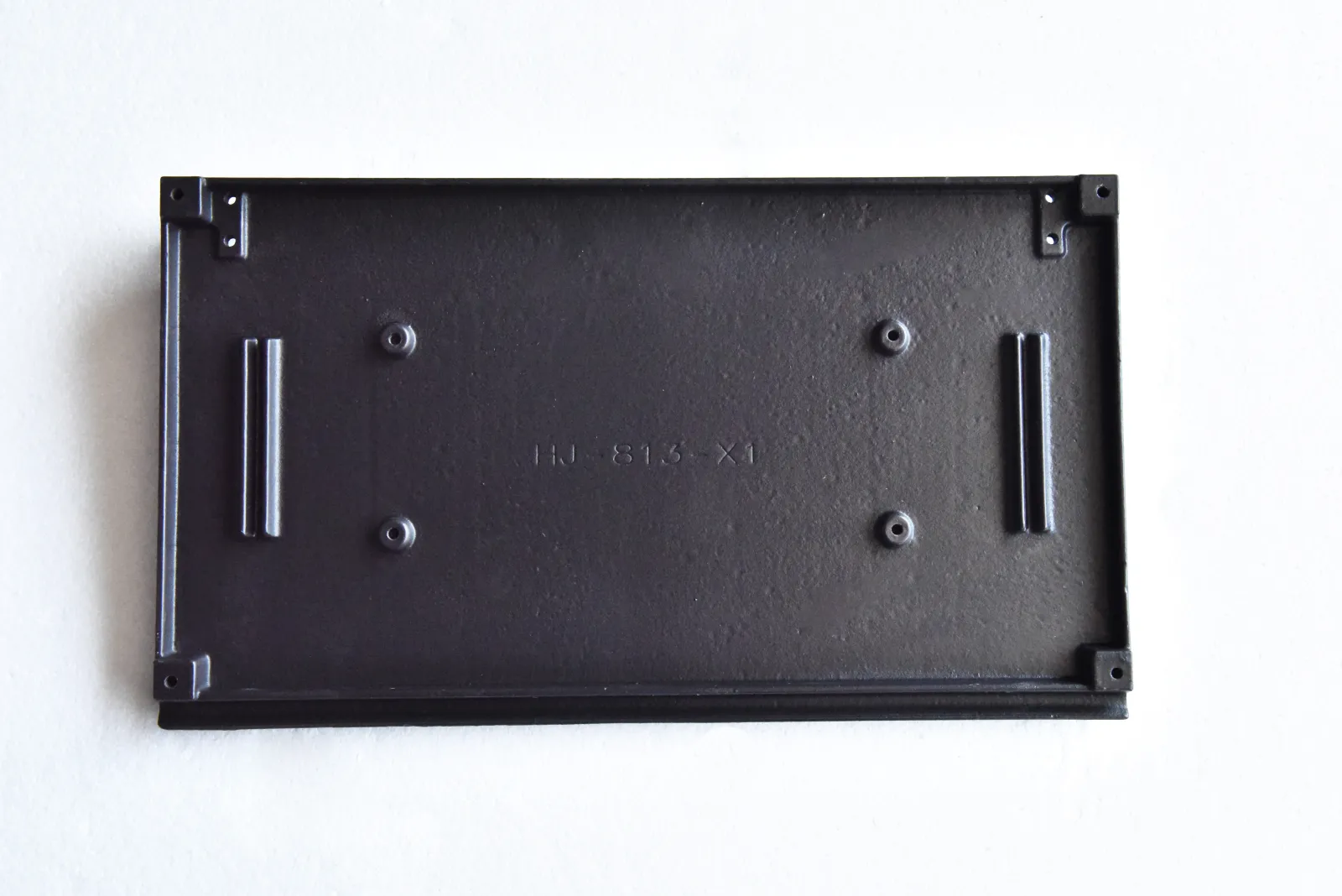 Custom cast iron component sample photographed for drawing or photo review
